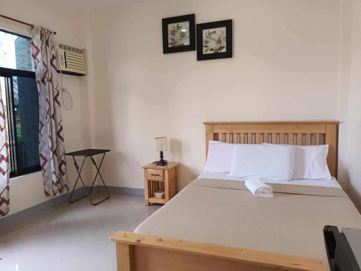 Grae'S Apartelle Moalboal Buitenkant foto